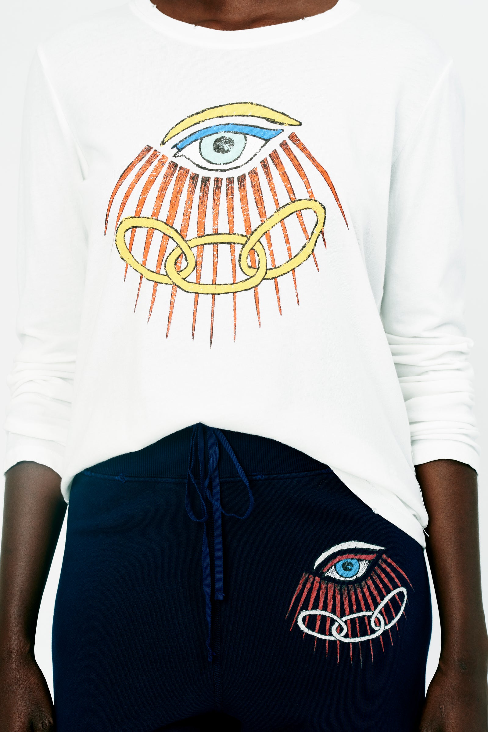 Washed White Evil Eye Fleece Long Sleeve Tee Front Close-Up View